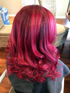 red hair vibrant curls special occasion styling brisbane mobile hairdresser chelley bean mobile hairdressing